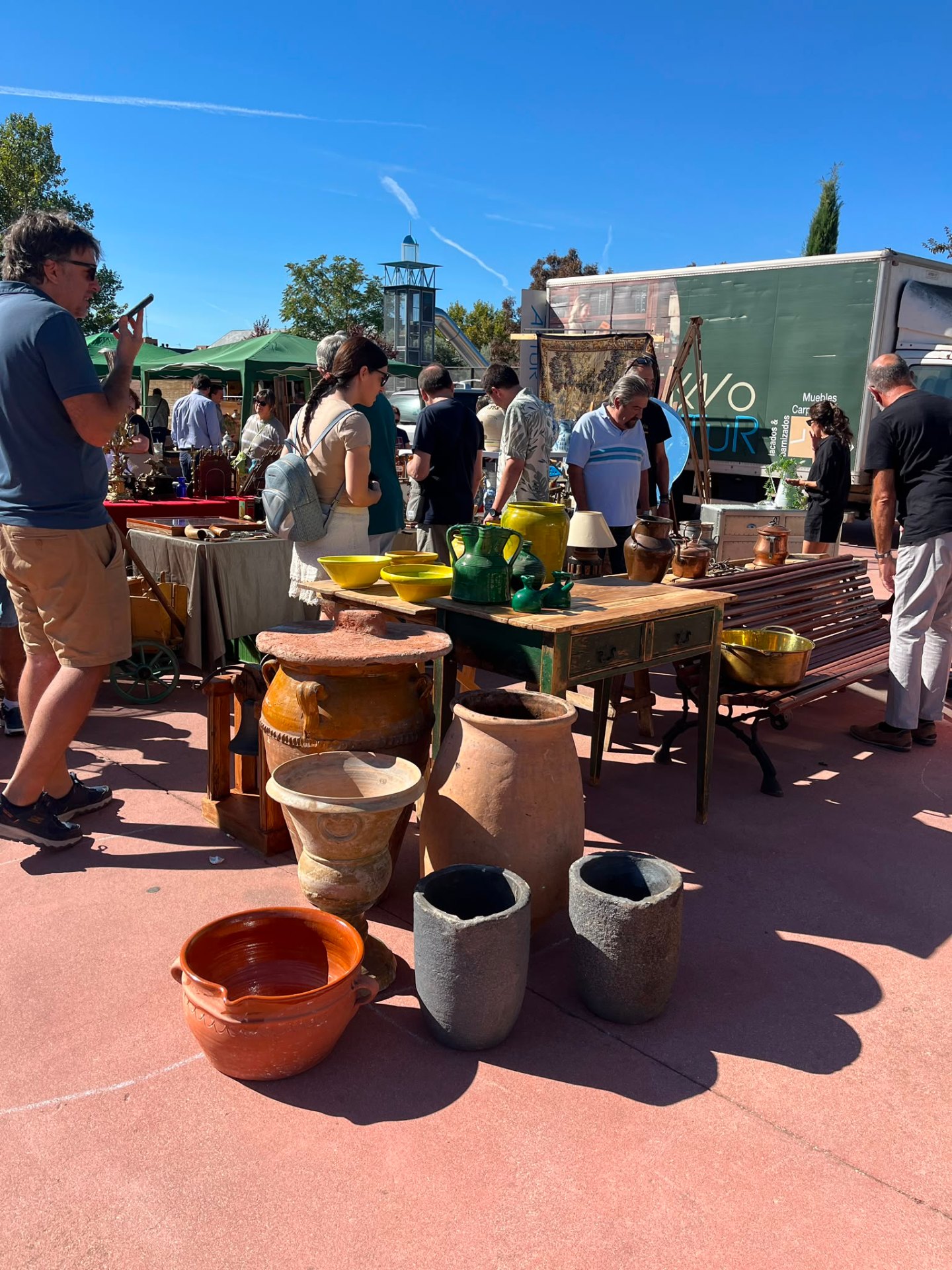 Spanish market stall with terracotta vessels and stoneware
